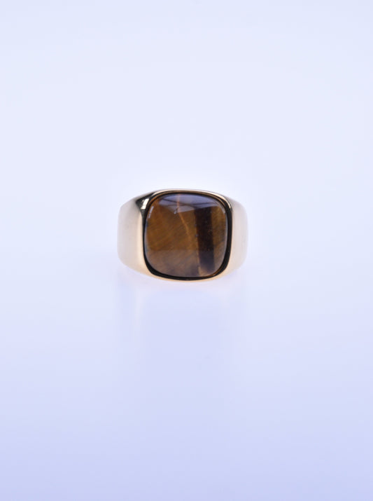 Gullfarget ring med brun edel